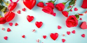 Heart-shaped candies and roses for Valentine's Day promotion.